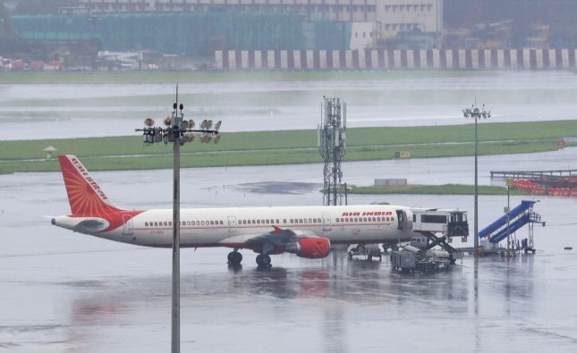 Air India’s Hong Kong–Delhi flight catches fire after landing at airport – ‘Passengers safe, aircraft grounded’
